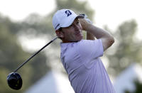 Brandt Snedeker watches his tee shot on the 11th hole during the first round of the Wyndham Championship golf tournament in Greensboro, N.C., Thursday, Aug. 16, 2018. (AP Photo/Chuck Burton)