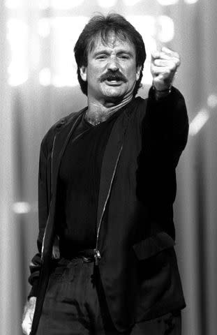 <p>Courtesy Everett</p> Robin Williams performs at the Comedy Store 15 years reunion in 1988