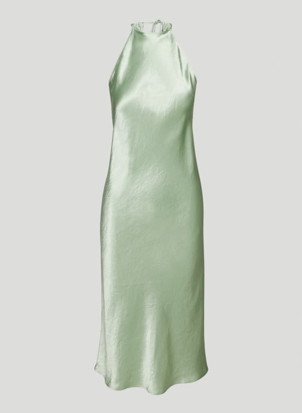 <p>Babaton Lato Satin Halter Midi Dress, $128, <a href="https://www.aritzia.com/us/en/product/lato-dress/77824029.html?gclid=Cj0KCQiAtJeNBhCVARIsANJUJ2E_lpbW9pyOUkKgUQQQgtx-QgrnRjRVL4UmecGKE15_asCiMxDsau8aAp2kEALw_wcB" rel="nofollow noopener" target="_blank" data-ylk="slk:available here;elm:context_link;itc:0;sec:content-canvas" class="link ">available here</a> (sizes 2XS-XL). </p>