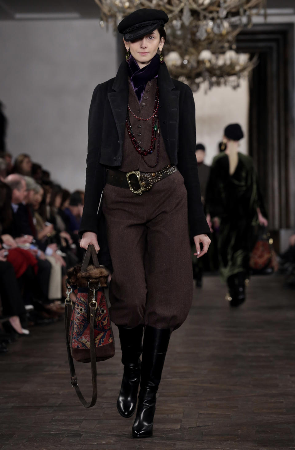The Ralph Lauren Fall 2013 collection is modeled during Fashion Week in New York, Thursday, Feb. 14, 2013. (AP Photo/Richard Drew)