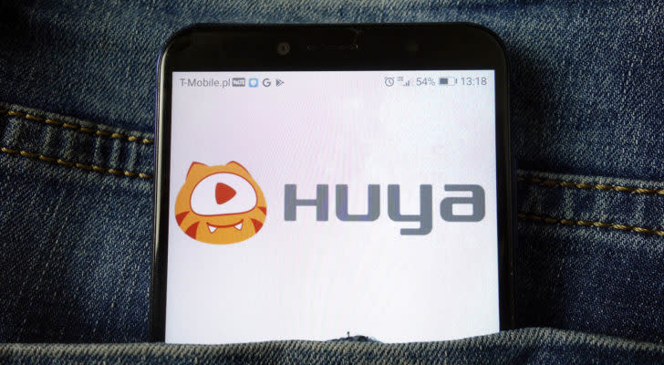 the HUYA logo displayed on a mobile phone