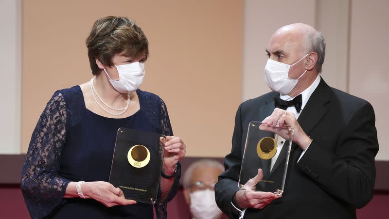 Japan Prize 2022 laureates Hungarian-American biochemist Katalin Kariko, left, and American physician-scientist Drew Weissman, right, pose with their trophies during the Japan Prize presentation ceremony Wednesday, April 13, 2022, in Tokyo. Kariko and Weissman were awarded the Nobel Prize in medicine for helping develop mRNA COVID-19 vaccines.