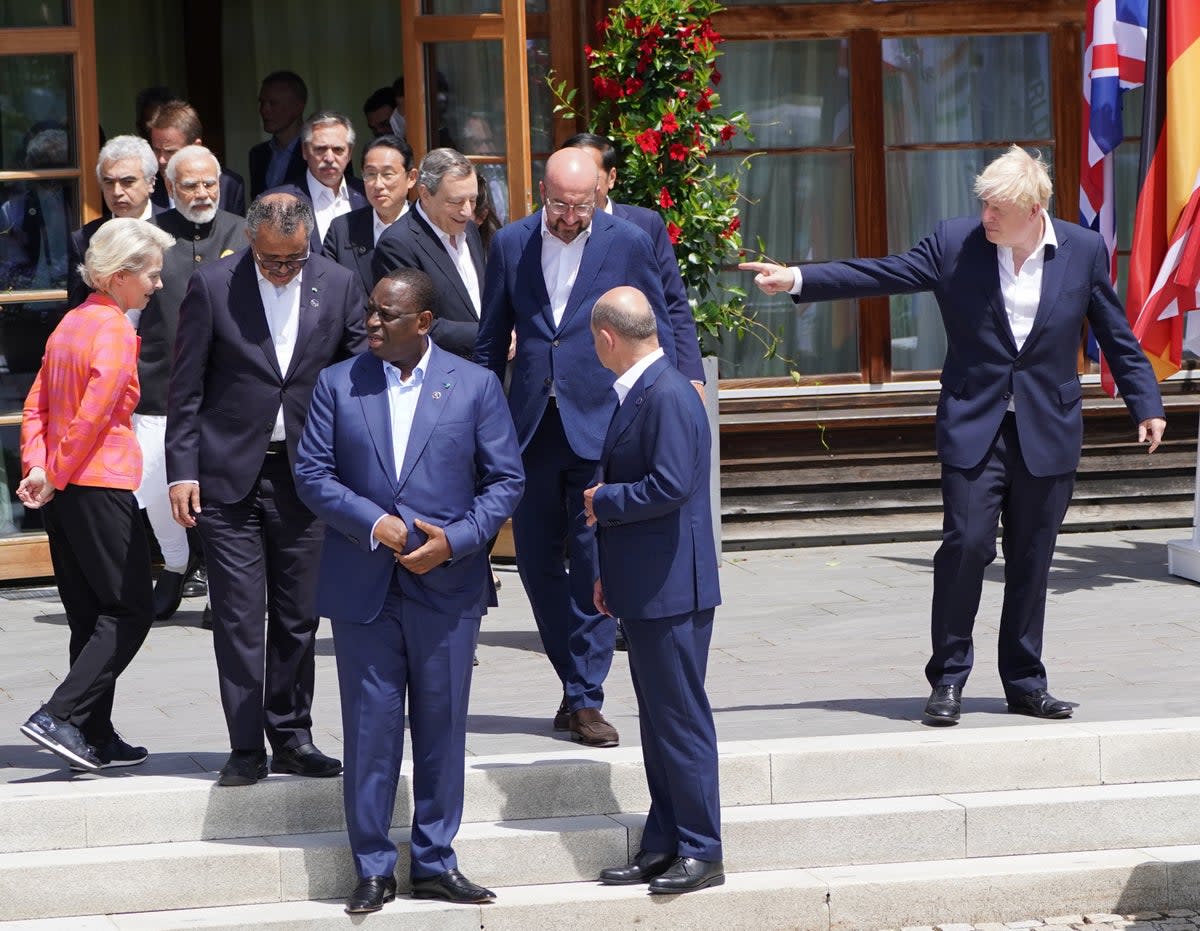 Prime Minister Boris Johnson (right) with other leaders from the G7 and partner countries during an extended family photo at Schloss Elmau in the Bavarian Alps (Stefan Rousseau/PA) (PA Wire)