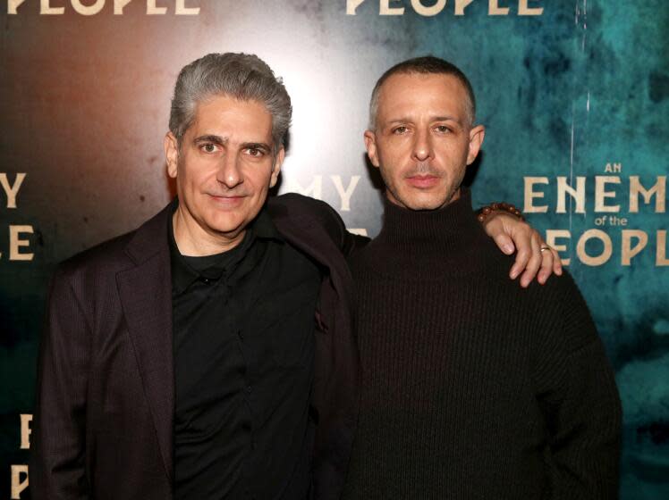 Michael Imperioli and Jeremy Strong pose in black at "An Enemy of the People" press event