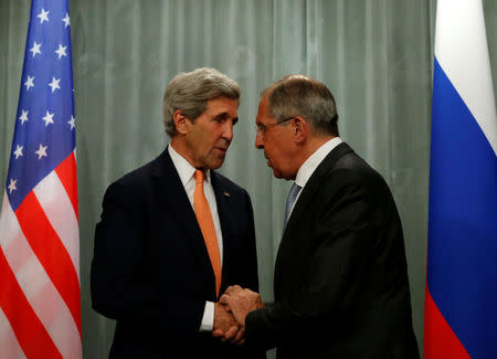 U.S. Secretary of State John Kerry (L) and Russian Foreign Minister Sergei Lavrov shake hands during a joint news conference following their meeting in Moscow, Russia, July 16, 2016. REUTERS/Sergei Karpukhin