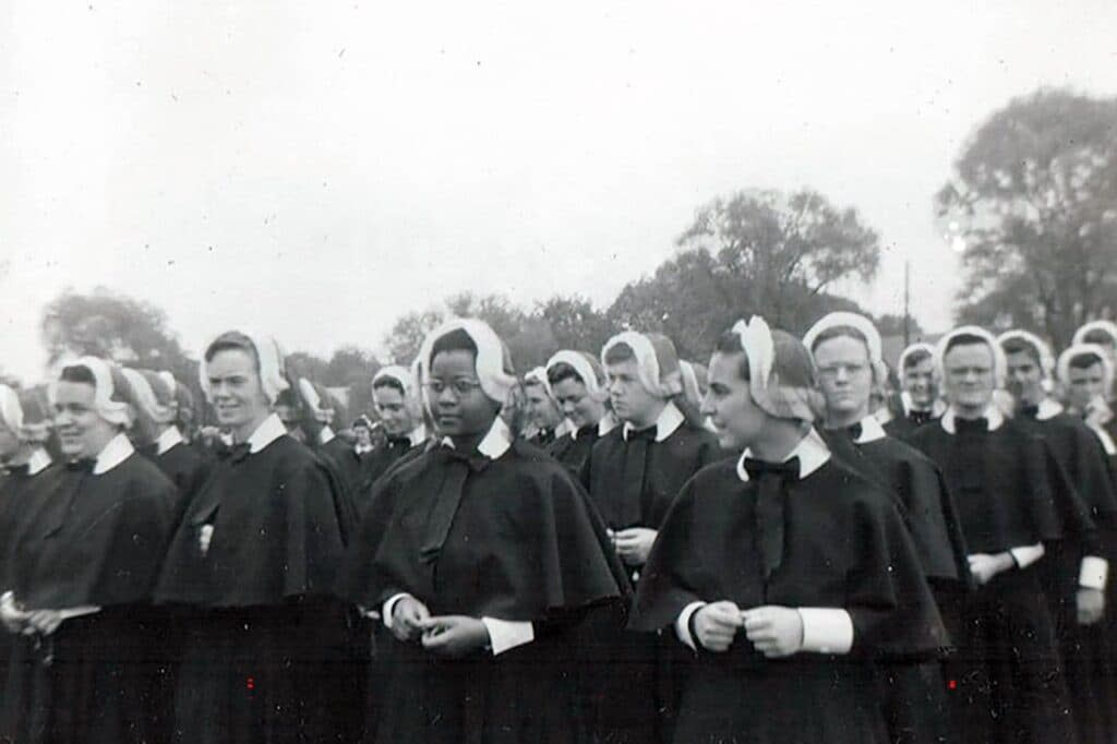This 1956 photo provided by Shannen Dee Williams shows Sister Cora Marie Billings, center, who as a 17-year-old in 1956 became the first Black person admitted into the Sisters of Mercy in Philadelphia. Later, she was the first Black nun to teach in a Catholic high school in Philadelphia and was a co-founder of the National Black Sisters’ Conference. (Courtesy Sister Cora Marie Billings/Shannen Dee Williams via AP)