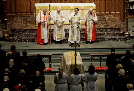 Rev. Dr. Russell J. Levenson, Jr., gives a sermon during a funeral service for former first lady Barbara Bush at St. Martin's Episcopal Church in Houston, Texas, U.S., April 21, 2018. David J. Phillip/Pool via Reuters