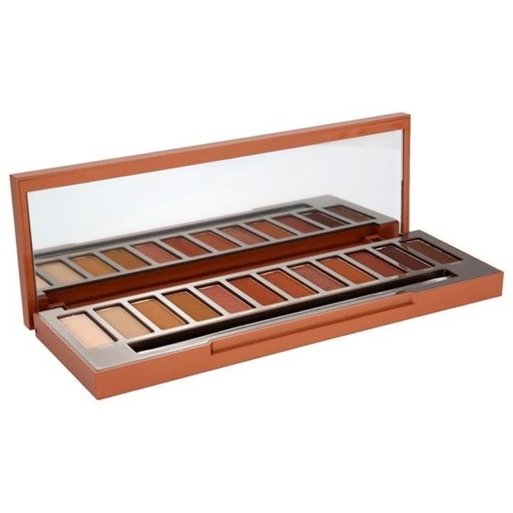 12 shades of amber eyeshadow in an orange case with a mirror