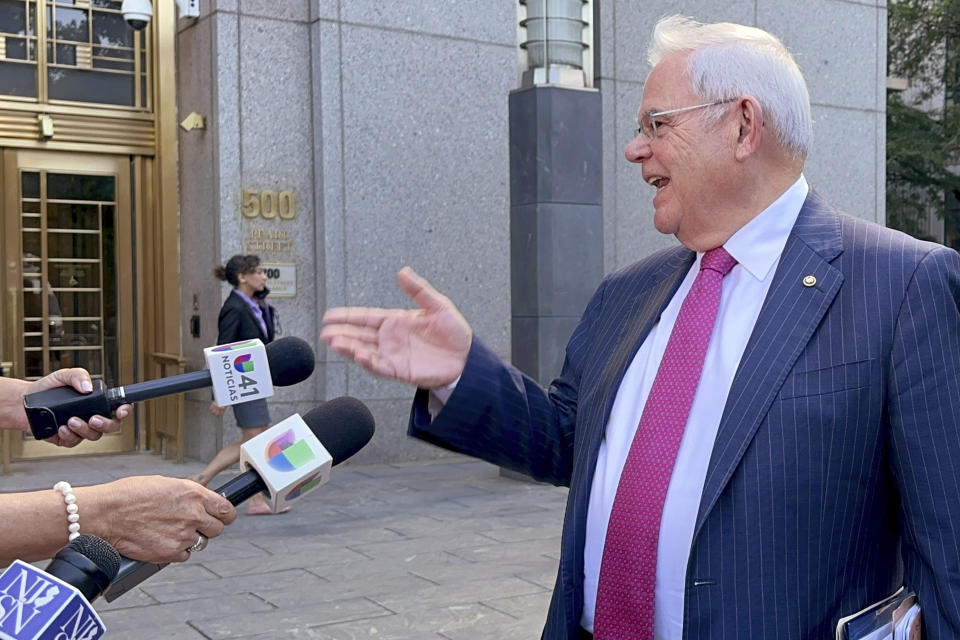 U.S. Sen. Bob Menendez, D-N.J., speaks reporters as he leaves federal court following the day's proceedings in his bribery trial, Monday, July 1, 2024, in New York. (AP Photo/Larry Neumeister)