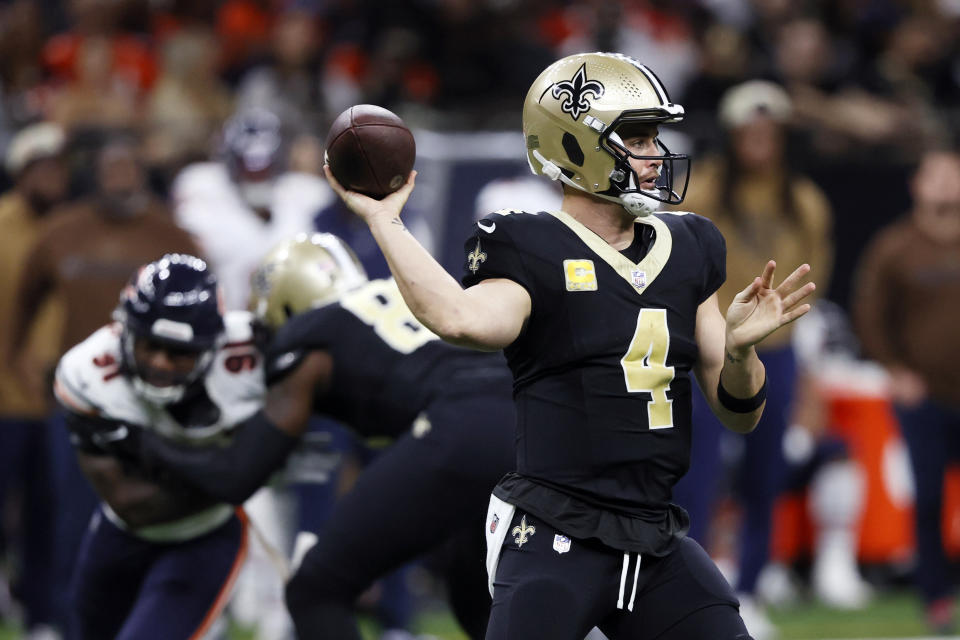 New Orleans Saints quarterback Derek Carr (4) throws a pass during the first half of an NFL football game against the Chicago Bears in New Orleans, Sunday, Nov. 5, 2023. (AP Photo/Butch Dill)