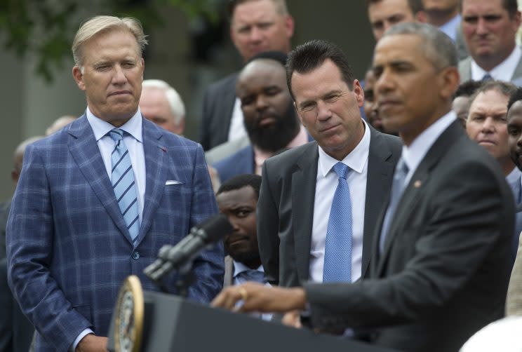 John Elway (left) and Gary Kubiak with President Barack Obama (right) at the White House this offseason (AP)