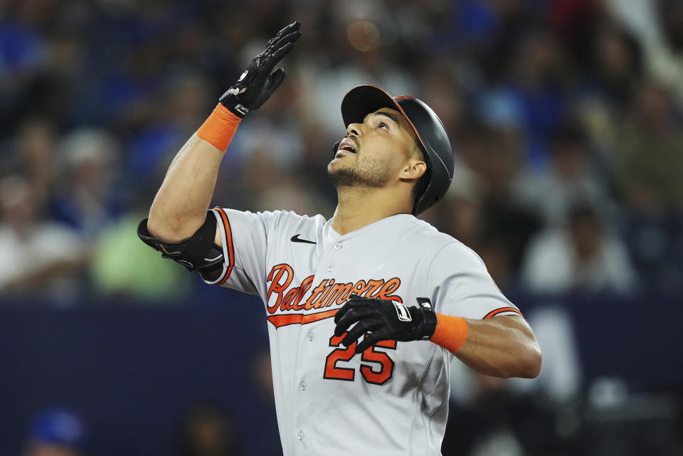 Baltimore Orioles' Anthony Santander (25) celebrates his grand slam against the Toronto Blue Jays during the eighth inning of a baseball game in Toronto on Tuesday, Aug. 1, 2023. (Nathan Denette/The Canadian Press via AP)