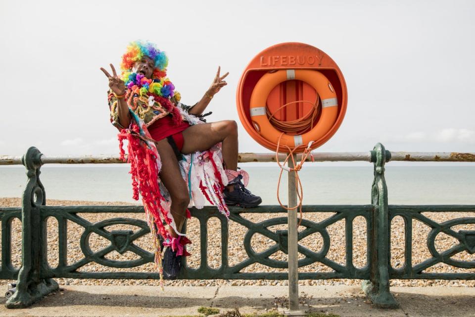 A parade goer poses for a photo ahead of the Brighton Pride Parade (Getty Images)