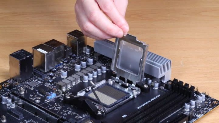 Someone opening AMD's AM5 socket.