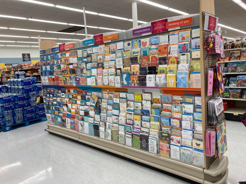 A shelf of greeting cards at Food Lion.