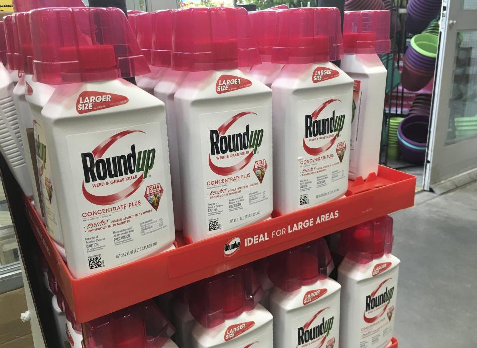 Containers of Roundup are displayed on a shelf. Bayer has faced many lawsuits over potential health problems that people say were caused by the weedkiller. It also has caused issues with resistant weeds, sparking the need for new types of herbicide chemicals.