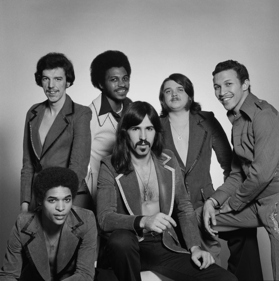 International funk and disco band Heatwave, February 1976. Left to right: guitarist Eric Johns (front), keyboard player Rod Temperton, singer Keith Wilder, bassist Mario Mantese, drummer Ernest 'Bilbo' Berger and singer Johnnie Wilder, Jr (1949 - 2006). (Photo by Michael Putland/Getty Images)