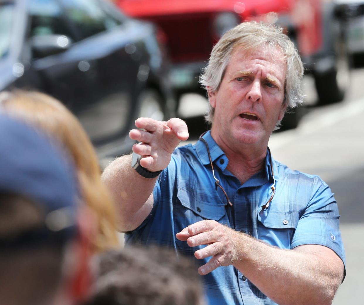 During this week’s committee meeting, Developer Mark McNabb, seen here speaking on site with city councilors in August, stated “that this isn’t really an issue of taking spaces away when spaces for crying out loud take both sides of every freaking street downtown.”