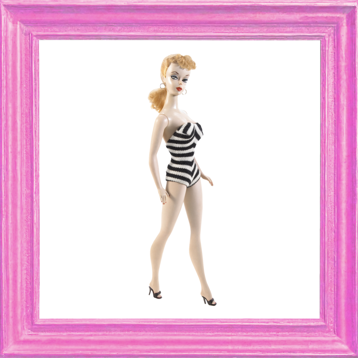 The first Barbie debuted in 1959 wearing a striped mailotte. (Mattel)