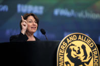 FILE - In this Aug. 14, 2019 file photo, Democratic presidential candidate Sen. Amy Klobuchar, D-Minn., speaks to union members during an International Union of Painters and Allied Trades convention at Caesars Palace in Las Vegas. (Steve Marcus/Las Vegas Sun via AP)