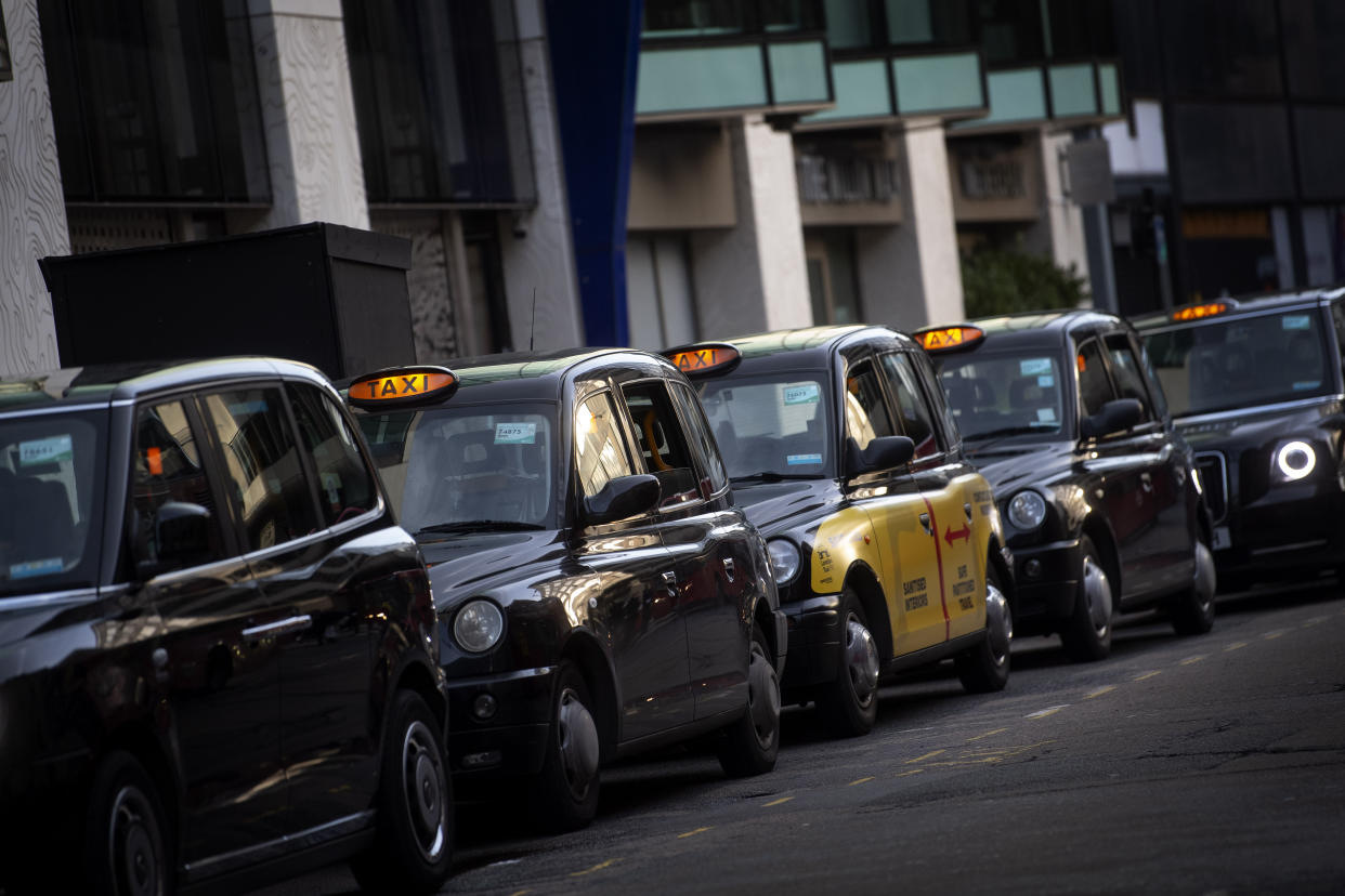 A queue of black cabs outside Victoria Station, London. London taxi drivers are facing long waits for a single fare after the industry has seen a severe drop in demand as coronavirus restrictions continue to reduce travel and office working. (Photo by Victoria Jones/PA Images via Getty Images)