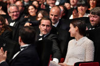 Les observateurs devront néanmoins se contenter des messages cryptés envoyés par Joaquin Phoenix par remise de prix interposée. Comme ce soir du 9 septembre 2019, lors du People’s Choice Award au Festival de Toronto, où il interpelle sa dulcinée en public : "<em>Une dernière chose, quelque part ici, je ne sais où, se trouve un dégoûtant petit dragon, et je veux lui arracher les ailes et en faire une couverture et dormir dedans pour toujours. Je t’aime. Merci</em>", déclare-t-il. Une certaine idée de la déclaration d’amour. (©<em>Getty Images</em>)