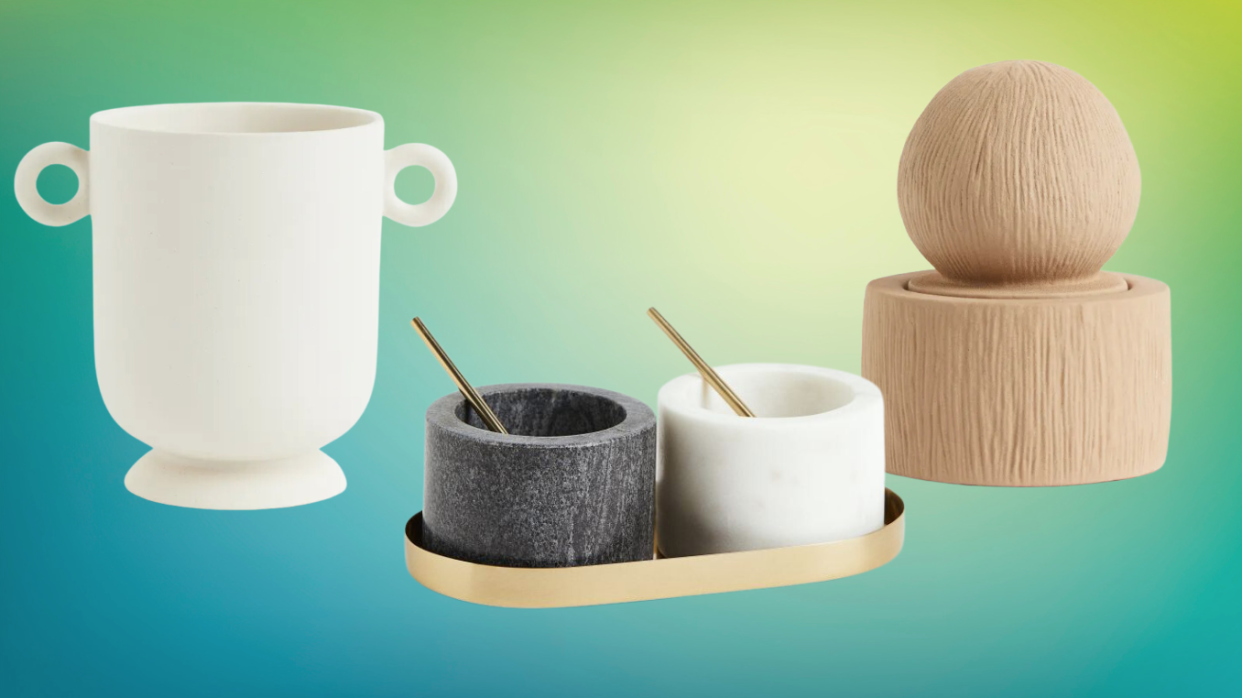  utensil holder, salt and pepper pots, and storage pot on a colorful background 