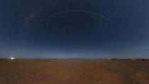 This photo provided by Japan Aerospace Exploration Agency (JAXA) shows the Japanese space capsule about to re-enter Earth with asteroid samples seen in Coober Pedy, southern Australia, on Sunday, Dec. 6, 2020. A Japanese capsule carrying the first samples of asteroid subsurface shot across the night atmosphere early Sunday before successfully landing in the remote Australian Outback, completing a mission to provide clues to the origin of the solar system and life on Earth. (JAXA via AP)