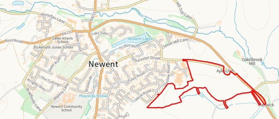 An outline on a geographical map of the plans, with the area earmarked for development highlighted with a red border. 