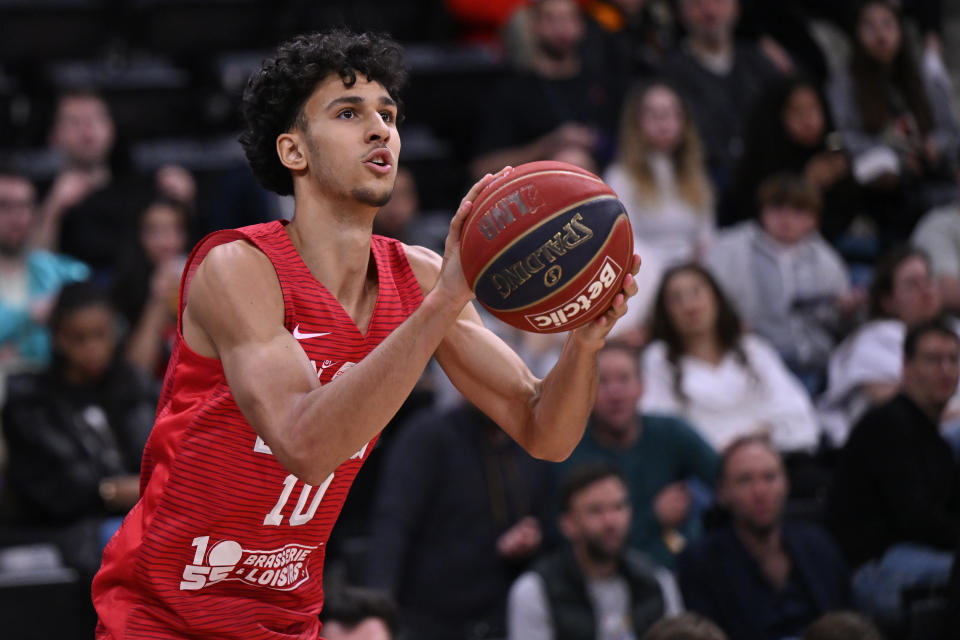 PARIS, FRANCE - APRIL 28: Zaccharie Risacher of Bourg en Bresse Basket takes a jump shoot during the Betclic Elite match between Paris and Bourg en Bresse Basket at Adidas Arena on April 28, 2024 in Paris, France. (Photo by Aurelien Meunier/Getty Images)