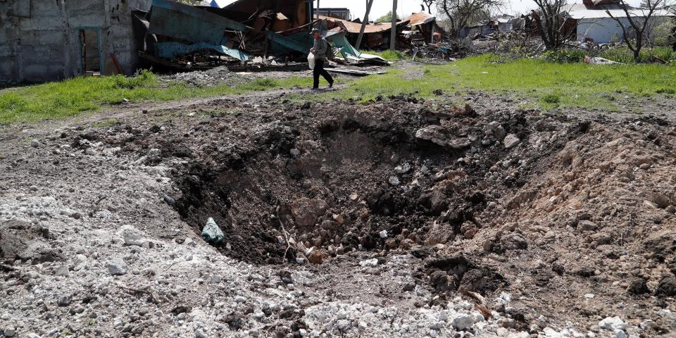 A view shows a shell crater in the course of Ukraine-Russia conflict in the southern port city of Mariupol, Ukraine May 3, 2022. REUTERS/Alexander Ermochenko
