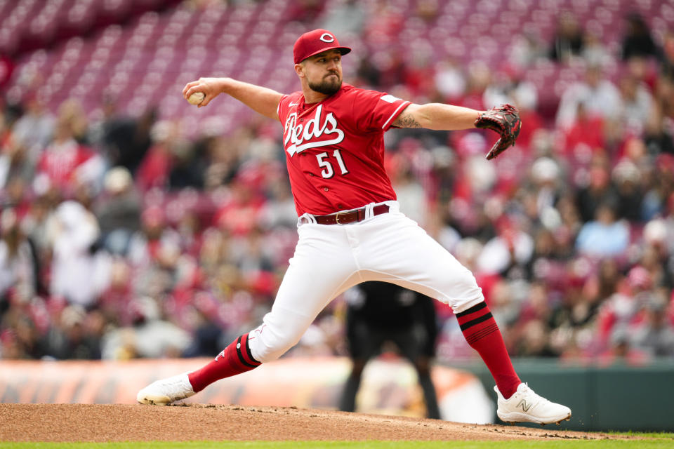 Cincinnati Reds starting pitcher Graham Ashcraft (51) throws against the Pittsburgh Pirates in the first inning of a baseball game in Cincinnati, Sunday, April 2, 2023. (AP Photo/Jeff Dean)