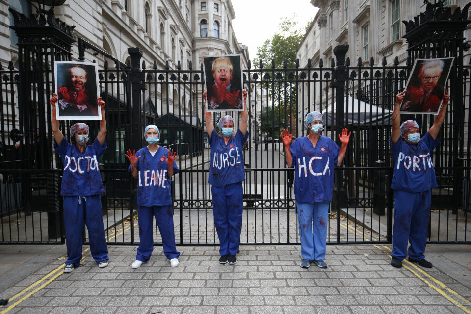 NHS workers outside Downing Street, London, attending a rally to demand the government give them a 15 per cent pay rise.