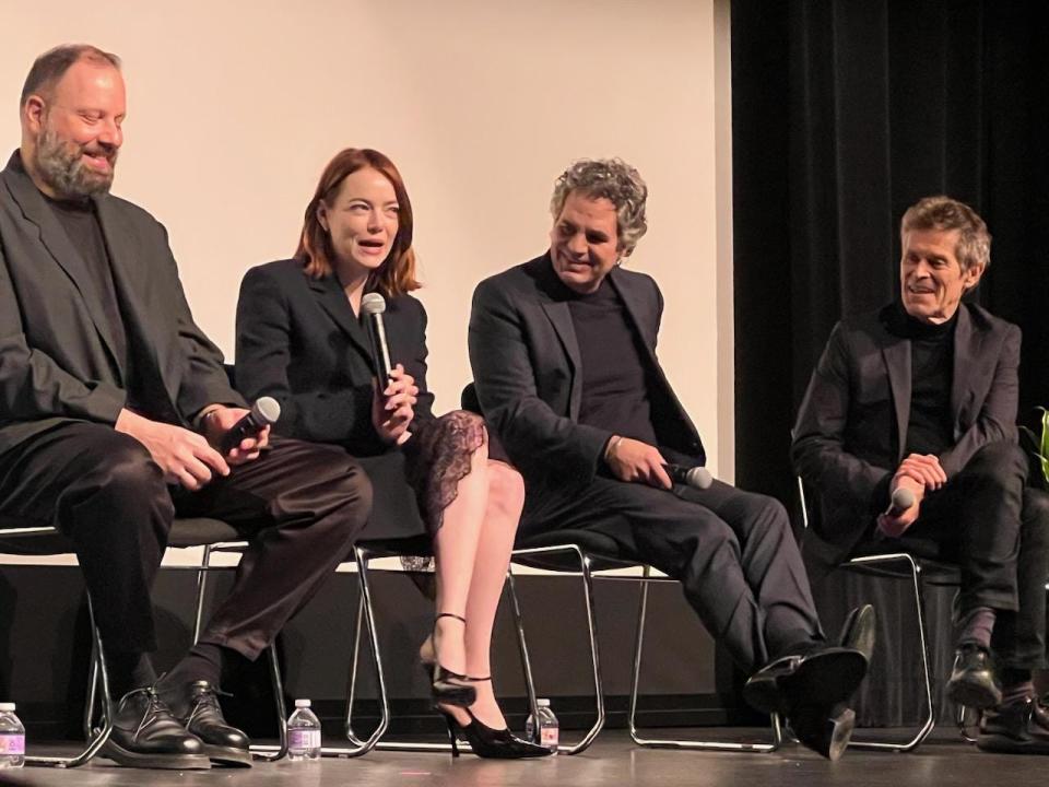 The director and cast of the film "Poor Things" gathers for a Q&A session after their movie screened Saturday as part of the Palm Springs International Film Festival. From left to right it's director Yorgos Lanthimos and actors Emma Stone, Mark Ruffalo and Willem Dafoe.