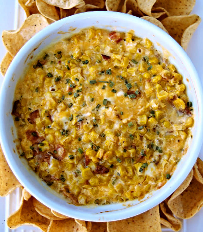 <p>Everyday Mom's Meals</p><p>This warm cheesy corn dip with <a href="https://parade.com/1105169/parade/bacon-recipes/" rel="nofollow noopener" target="_blank" data-ylk="slk:bacon;elm:context_link;itc:0;sec:content-canvas" class="link rapid-noclick-resp">bacon</a> is a delicious appetizer or side dish.</p><p><strong>Get the recipe: </strong><strong><a href="https://parade.com/841925/recipe-creator-krist-marshall/corn-dip-recipe/" rel="nofollow noopener" target="_blank" data-ylk="slk:Corn Dip with Bacon Recipe;elm:context_link;itc:0;sec:content-canvas" class="link rapid-noclick-resp">Corn Dip with Bacon Recipe</a></strong></p>