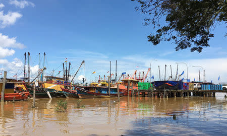 Malaysian fishing boats moored at the Bintulu fishing jetty to land their catch on May 5, 2016. REUTERS/Joseph Sipalan