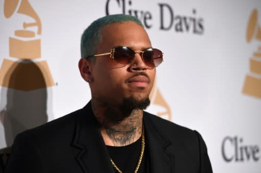 Chris Brown was arrested in Paris on suspicion of rape (AFP)