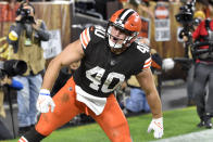 Cleveland Browns running back Johnny Stanton celebrates after scoring a one-yard touchdown during the second half of an NFL football game against the Denver Broncos, Thursday, Oct. 21, 2021, in Cleveland. (AP Photo/David Richard)