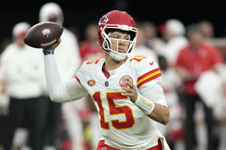 Kansas City Chiefs quarterback Patrick Mahomes (15) passes against the Las Vegas Raiders during the first half of an NFL football game, Sunday, Nov. 26, 2023, in Las Vegas. (AP Photo/John Locher)