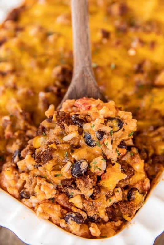 <p>Plain Chicken</p><p>This is a quick and easy Mexican casserole that you can even make ahead and then bake at dinner time. </p><p><strong>Cost: $13.71</strong></p><p><strong>Get the recipe: <a href="https://www.plainchicken.com/taco-black-bean-rice-casserole/" rel="nofollow noopener" target="_blank" data-ylk="slk:Taco, Black Bean and Rice Casserole;elm:context_link;itc:0;sec:content-canvas" class="link rapid-noclick-resp">Taco, Black Bean and Rice Casserole</a></strong></p>