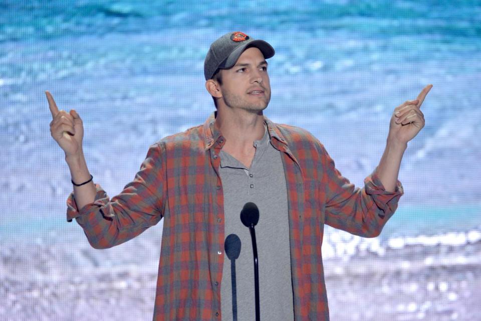 Ashton Kutcher accepts the ultimate choice award at the Teen Choice Awards at the Gibson Amphitheater on Sunday, Aug. 11, 2013, in Los Angeles. (Photo by John Shearer/Invision/AP)