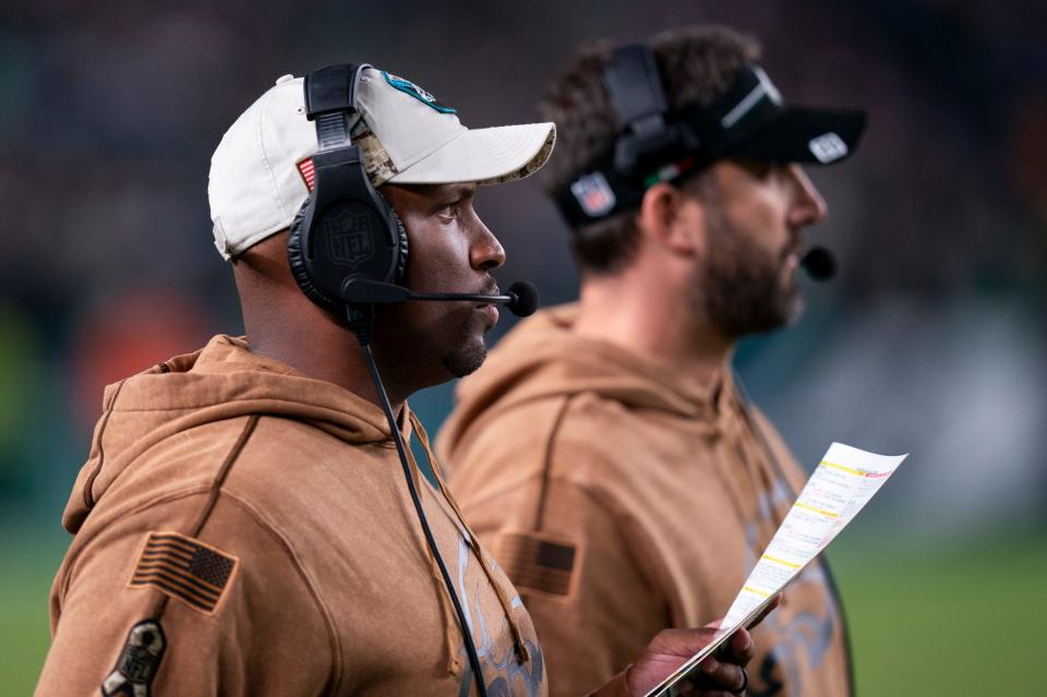 Philadelphia Eagles offensive coordinator Brian Johnson, left, looks on with head coach Nick Sirianni, right, during the NFL football game against the Dallas Cowboys, Sunday, Nov. 5, 2023, in Philadelphia.