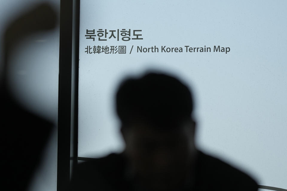 A sign of North Korea is seen at the unification observatory in Paju, South Korea, Wednesday, April 19, 2023. North Korean leader Kim Jong Un said his country has completed the development of its first military spy satellite and ordered officials to go ahead with its launch as planned, state media reported Wednesday. (AP Photo/Lee Jin-man)