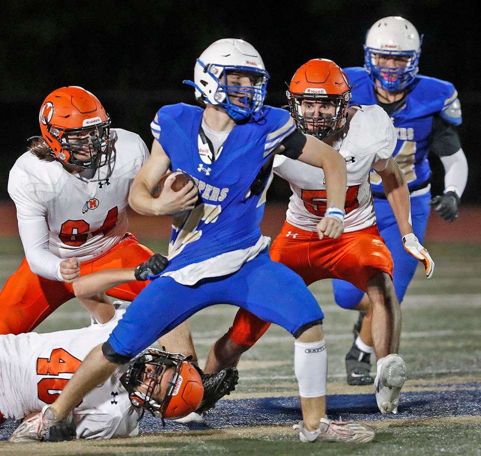 Clipper William Bostrom fights to break a Middleboro tackle.

The Norwell Clippers host the Middleboro Sachems on the gridiron on Friday, Oct. 13, 2023