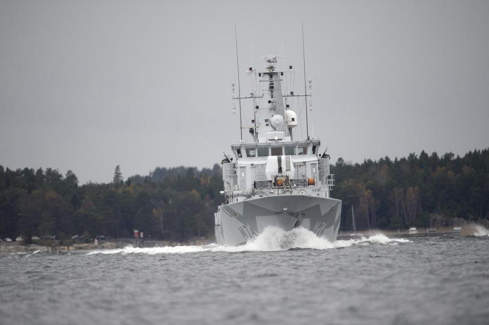 The Swedish minesweeper HMS Kullen is seen in the search for suspected "foreign underwater activity" at Namdo Bay, Stockholm October 21, 2014. Sweden's military is working on two new observations that could be evidence of suspected "foreign underwater activity" near the country's capital, a senior naval officer said on Tuesday. Swedish forces have been scouring the sea off Stockholm since Friday, after what the military called three credible reports of activity by foreign submarines or divers using an underwater vehicle. REUTERS/Fredrik Sandberg/TT News Agency (SWEDEN - Tags: MILITARY POLITICS) ATTENTION EDITORS - FOR EDITORIAL USE ONLY. NOT FOR SALE FOR MARKETING OR ADVERTISING CAMPAIGNS. THIS IMAGE HAS BEEN SUPPLIED BY A THIRD PARTY. IT IS DISTRIBUTED, EXACTLY AS RECEIVED BY REUTERS, AS A SERVICE TO CLIENTS. SWEDEN OUT. NO COMMERCIAL OR EDITORIAL SALES IN SWEDEN. NO COMMERCIAL SALES