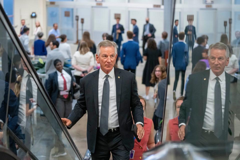 Sen. Tommy Tuberville, R-Ala., talks with reporters as he walks to a vote on Capitol Hill, Wednesday, Sept. 6, 2023 in Washington.