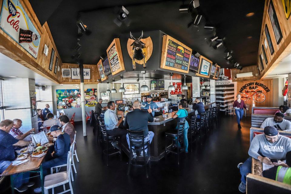 People stop by for lunch at the Mercury Burger Bar in the Corktown neighborhood of Detroit, on Thursday, May 30, 2024.