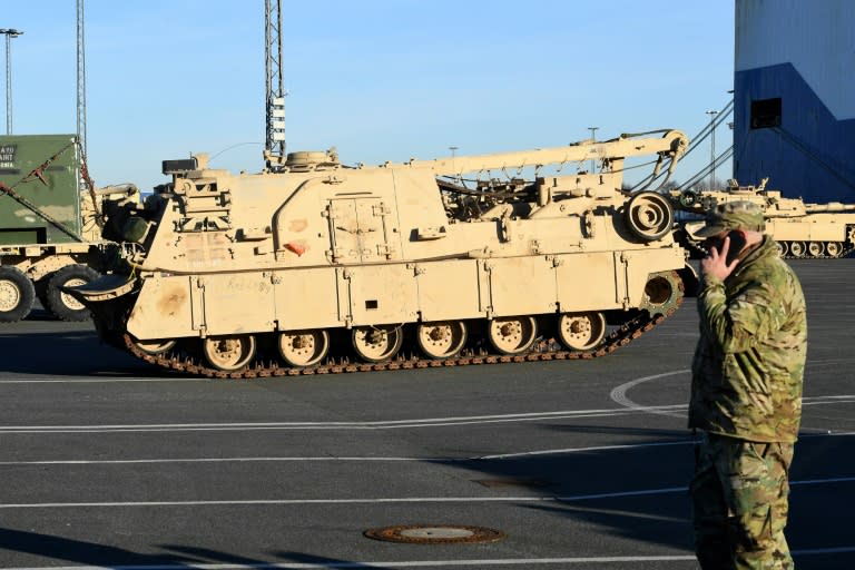 US military vehicles are unloaded from a transport ship in the harbour in Bremerhaven, northwestern Germany