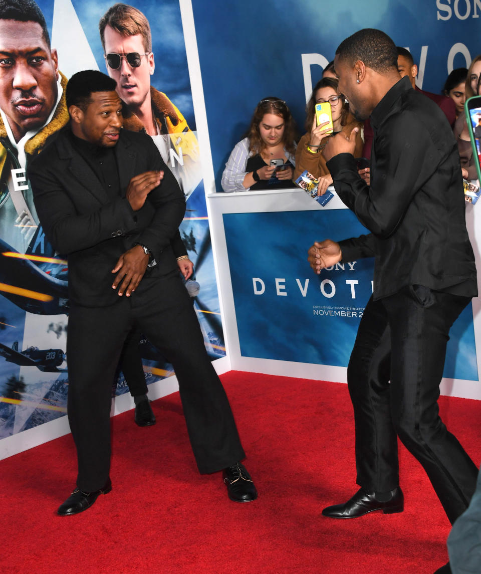 Michael B Jordan and Jonathan Majors play boxing on red carpet