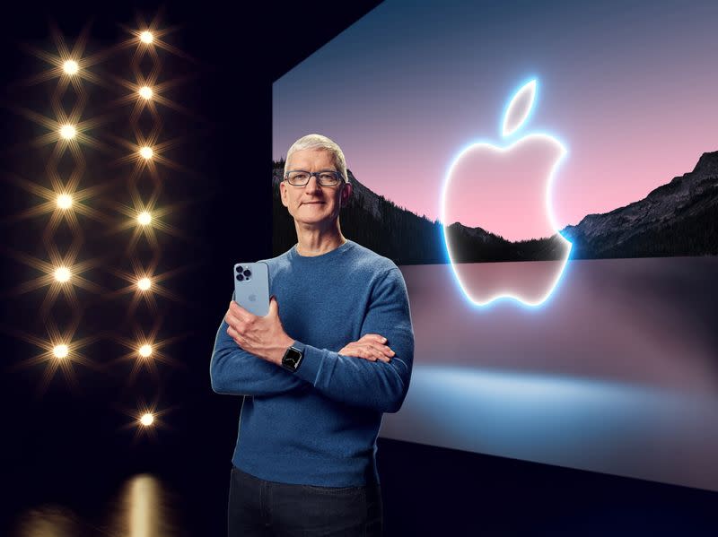 Apple CEO Tim Cook showcases the advanced camera system on the new iPhone 13 Pro